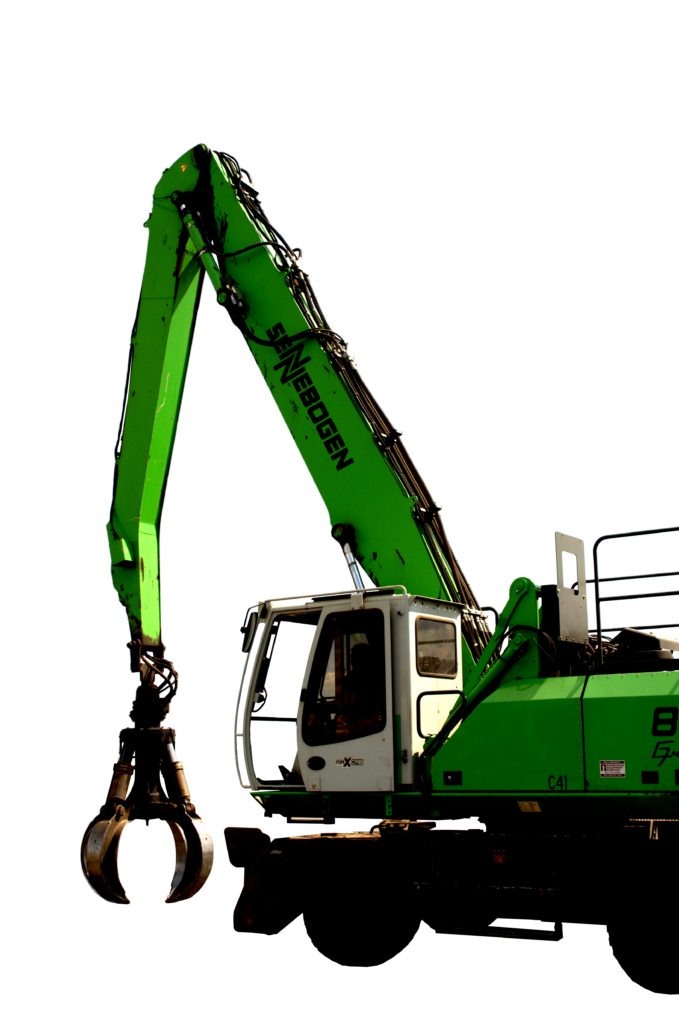 Image of a green crane moving a large object.