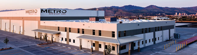 Metro Building nestled in mountainous landscape.